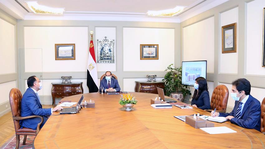 President El-Sisi Meets with PM and Minister of International Cooperation